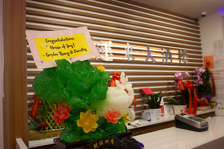 a jade cabbage at the front dest of House of Joy